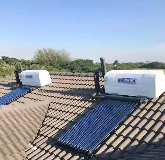 Two white solar geysers installed on a residential Cape Town property